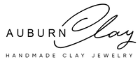 Auburn Clay logo